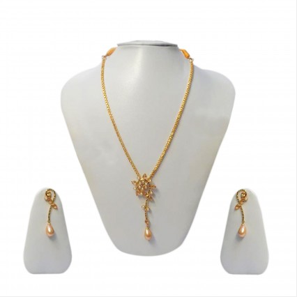 This Necklace set is a unique one which make beautiful design with red and green stone