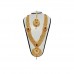 Beautiful work in artificial red stone with ethnic and modern combination golden work, this is a really warm and glowing necklace set. It’s very ethnic earring adds to the festive appearance as it truly dazzles